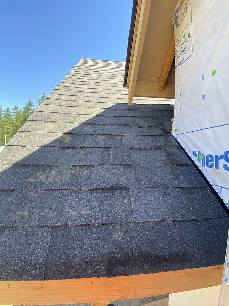 Picture of installing new roof in Lacey, WA